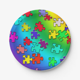 Multicolored jigsaw puzzles pieces paper plates