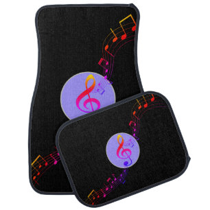 Multicolored musical notes on black car floor mat