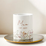 Mum Established Wildflower Terracotta Baby Shower Coffee Mug<br><div class="desc">Celebrate the beauty of motherhood with our "Mum Established Wildflower Terracotta Baby Shower Coffee Mug." Crafted with love and care, this terracotta-toned mug serves as a charming reminder of the precious journey ahead. The wildflower design symbolizes the unique and blossoming bond between mother and child. "Mum Established" proudly displayed adds...</div>