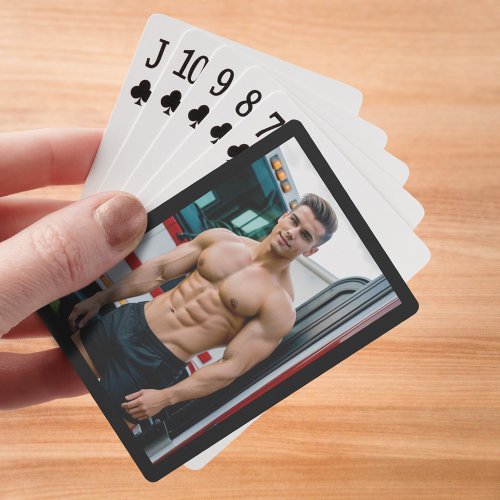 Muscular Firefighter in Black Shorts Playing Cards
