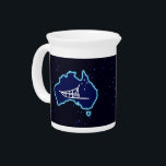 Mushing Down Under Beverage Pitcher<br><div class="desc">A simple white silhouette of a dog sled and the Southern Cross superimposed on a blue map of Australia. All on a starfield background. Who would have thunk it? Mushing upside down in Oz. Dog sledding is quite popular in Australia. At Mount Hotham in Victoria there is a big race...</div>