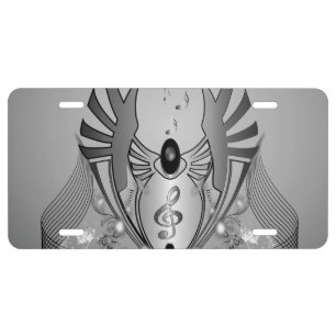 Music, clef in black and white on a shield license plate