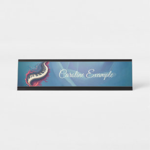 Music in motion, the curved piano.  desk name plate