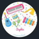 Music instruments kids birthday classic round sticker<br><div class="desc">Strike up the band—it's time to party! 🎶🎉 Our Zazzle kids' birthday item hits all the right notes with its music theme. It's a concert of fun waiting to happen! With musical notes and instruments in vibrant colors, this item sets the stage for a celebration that's as lively as a...</div>