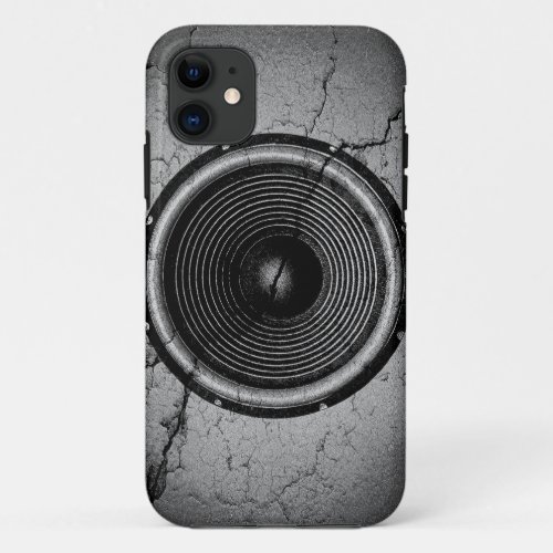 Music speaker on a cracked wall iPhone 11 case