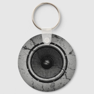 Music speaker on a cracked wall keychain