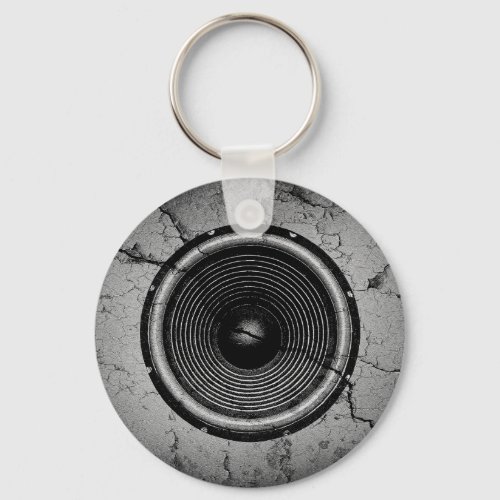 Music speaker on a cracked wall keychain