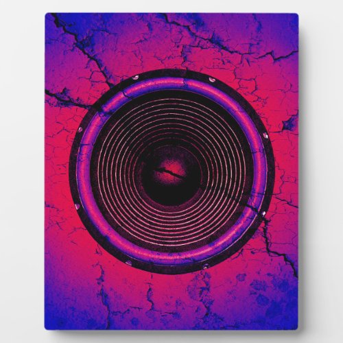 Music speaker on a cracked wall plaque