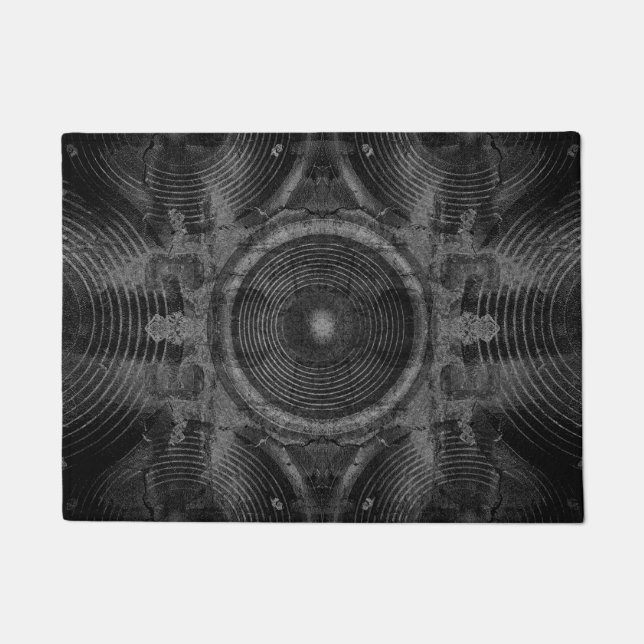 Music speakers on a cracked wall doormat (Front)