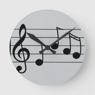 Musical notation treble clef and staff round clock