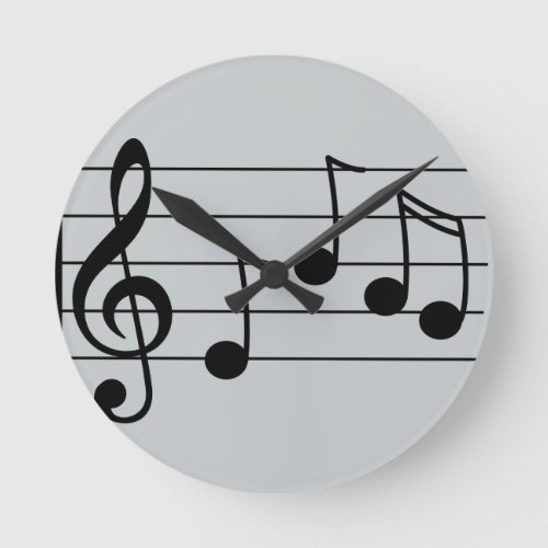 Musical notation treble clef and staff round clock