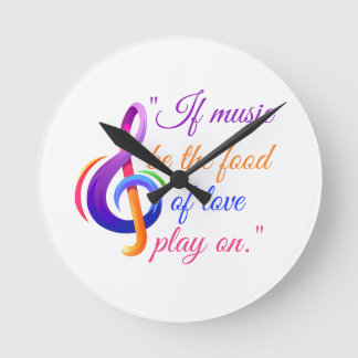 Musical note clock with music quote.