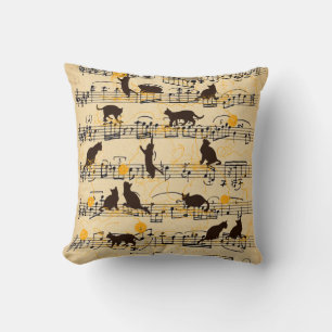 Musical notes and kittens throw pillow