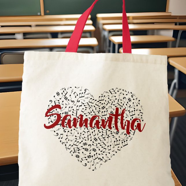Musical Notes Heart w/ Red Script Name Sheet Music Tote Bag (Music lover personalized tote bag with heart made of notes and any name in bold red script.)