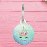 Musical Unicoprn Horn and Flowers Round Pet Tag<br><div class="desc">Does your pet think he or she is a unicorn? Perhaps he or she dreams of rainbows? This design features a silver spiral unicorn's horn, a bouquet of lovely multicolored flowers, and "eyelashes" against a backdrop of a vintage music score tinted in turquoise and gray. Type your pet's name in...</div>