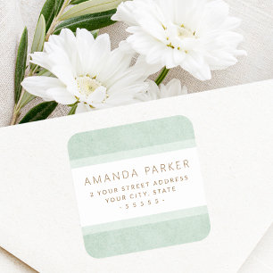 Muted green borders return address labels