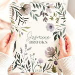 Muted Watercolor Floral 2025 Custom Name Planner<br><div class="desc">Embrace the gentle beauty of muted blooms with this elegant planner. Watercolor florals in soft shades of lavender and gray create a serene backdrop for your dreams and aspirations. Imagine yourself jotting down your thoughts and appointments amidst this tranquil garden. Personalize it with your name and let this planner be...</div>