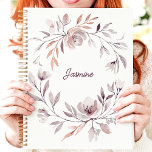 Muted Watercolor Floral Wreath Custom Name Planner<br><div class="desc">This elegant planner design features a muted watercolor floral wreath in soft tones of blush, mauve, and taupe. The gentle arrangement encircles a custom name in a delicate script, creating a personalized and refined touch. Ideal for organizing your daily tasks, appointments, or creative ideas with a feminine and sophisticated style....</div>