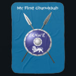 My First Chanukkah Maccabee Baby Blanket<br><div class="desc">A depiction of a Maccabee's shield and two spears. The shield is adorned by a lion and text reading "Yisrael" (Israel) in the Paleo-Hebrew alphabet. Text reading "My First Chanukkah" also appears. The Maccabees were Jewish rebels who freed Judea from the yoke of the Seleucid Empire. Chanukkah is not just...</div>
