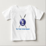 My First Chanukkah Maccabee Baby T-Shirt<br><div class="desc">A depiction of a Maccabee's shield and two spears. The shield is adorned by a lion and text reading "Yisrael" (Israel) in the Paleo-Hebrew alphabet. Customizable text reading "My First Chanukkah" also appears. The Maccabees were Jewish rebels who freed Judea from the yoke of the Seleucid Empire. Chanukkah is not...</div>