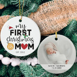 My first Christmas as mom with name and photo Ceramic Ornament<br><div class="desc">Show your happiness for your first Christmas as a mom with this lovely first Christmas ornament decorated with a red Santa hat,  holly leaves,  and colorful Christmas lights. Easily customizable with the baby's name and date of birth and one of your favorite pictures on the reverse.</div>