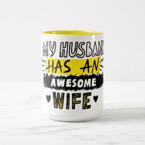 My husband has an awesome wife  Two_Tone coffee mug