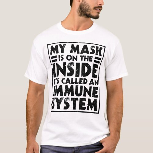 My mask is on the inside its called an immune sys T_Shirt