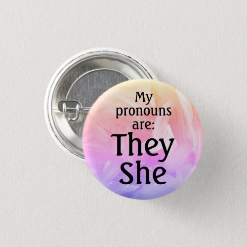 My pronouns are They She Button
