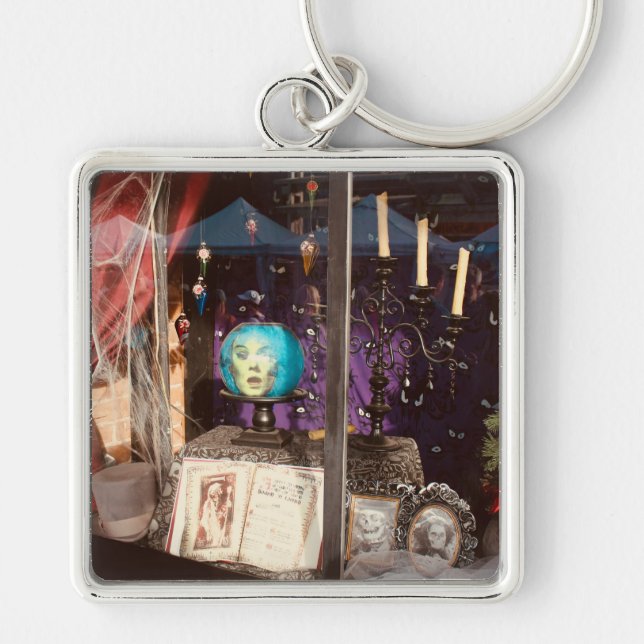 Mysterious Haunted Storefront in a Shop Keychain (Front)