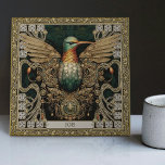 Mystical Hummingbird Tribal Jewel Tribute Ceramic Tile<br><div class="desc">Step into a realm where the physical and spiritual converge with our meticulously crafted 'Mystical Hummingbird Tribal Jewel Ceramic Tile'. Inspired by an amalgamation of unique art styles - tribal aesthetics, happycore optimism, carpet punk rebellion, and symmetrical harmony, this tile resonates with a rich visual narrative. The core motif features...</div>