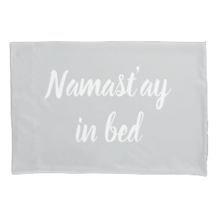 Namastay in bed brush script lettering light grey pillow case