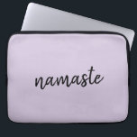 Namaste | Lilac Purple Stylish Yoga Meditation Zen Laptop Sleeve<br><div class="desc">Simple, stylish "namaste" quote art design in modern minimalist handwritten script typography on a pastel lavender lilac purple background. The slogan can easily be personalized with your own words for a perfect gift for a yoga bunny or pilates lover! Namasté literally means "greetings to you." In the Vedas, namaste mostly...</div>