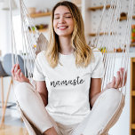 Namaste | Modern Spiritual Meditation Yoga T-Shirt<br><div class="desc">Simple, stylish "namaste" quote art design in modern minimalist handwritten script typography. The slogan can easily be personalized with your own words for a perfect gift for a yoga bunny or pilates lover! Namasté literally means "greetings to you." In the Vedas, namaste mostly occurs as a salutation to a divinity....</div>