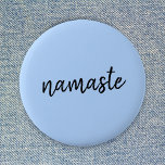 Namasté | Pastel Blue Yoga Spiritual Salutation Button<br><div class="desc">Simple, stylish "namaste" quote art design in modern minimalist handwritten script typography on a pastel blue background. The slogan can easily be personalized with your own words for a perfect gift for a yoga bunny or pilates lover! Namasté literally means "greetings to you." In the Vedas, namaste mostly occurs as...</div>