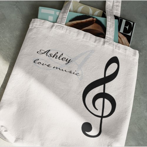 Name initial  black treble clef music tote bag