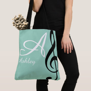 Name, initial & black treble clef teal music tote bag