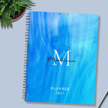 Name Monogram Blue Planner<br><div class="desc">This stylish Planner is decorated with an atmospheric design in shades of blue and turquoise.
Easily customizable with your name,  monogram,  and year.
Use the Design Tool option to change the text size,  style,  and color.</div>