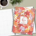 Name Monogram Foliage Planner<br><div class="desc">This colorful Planner is decorated with a watercolor leaves pattern in rusts, yellows, and purples. Easily customizable with your name, monogram, and year. Use the Design Tool option to change the text size, style, and color. Because we create our artwork you won't find this exact image from other designers. Original...</div>