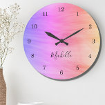 Name Monogram Pink Purple Large Clock<br><div class="desc">This colourful Wall Clock is decorated with a swirl pattern in pink and purple.
Easily customizable with your name or monogram.
Use the Customize Further option to change the text size,  style or color if you wish.</div>