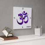 Name on Purple Space Om Symbol 10.75-in Square Wall Clock<br><div class="desc">This is a stylish 10.75" diameter grade-A square acrylic wall clock. Also available in an 8" or 10.75" round style IF you remove the name. Easily change name, change to text, initials or remove using the Template provided. The background is a platinum color with large Om symbol in a royal...</div>
