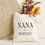 Nana Roman Numeral Year Established Tote Bag<br><div class="desc">A modern minimalist tote bag to celebrate a chic grandma,  this clean minimal tote features "Nana" or your choice of grandma nickname in black serif lettering. Customize with the year she became a grandmother beneath in elegant roman numerals for a chic touch.</div>