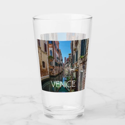 Narrow street with canal in Venice Glass