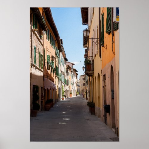 Narrow street with old facades in tuscany village poster