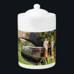 NARROWBOATS TEAPOT<br><div class="desc">Canal boats, known in the UK as narrowboats, were originally used to transport goods around the country. They are now used mainly for leisure and attract people from all over the world to enjoy our rural countryside. These boats look very pretty with their brightly colored cabins, traditionally blue, red or...</div>