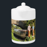 NARROWBOATS TEAPOT<br><div class="desc">Canal boats, known in the UK as narrowboats, were originally used to transport goods around the country. They are now used mainly for leisure and attract people from all over the world to enjoy our rural countryside. These boats look very pretty with their brightly colored cabins, traditionally blue, red or...</div>
