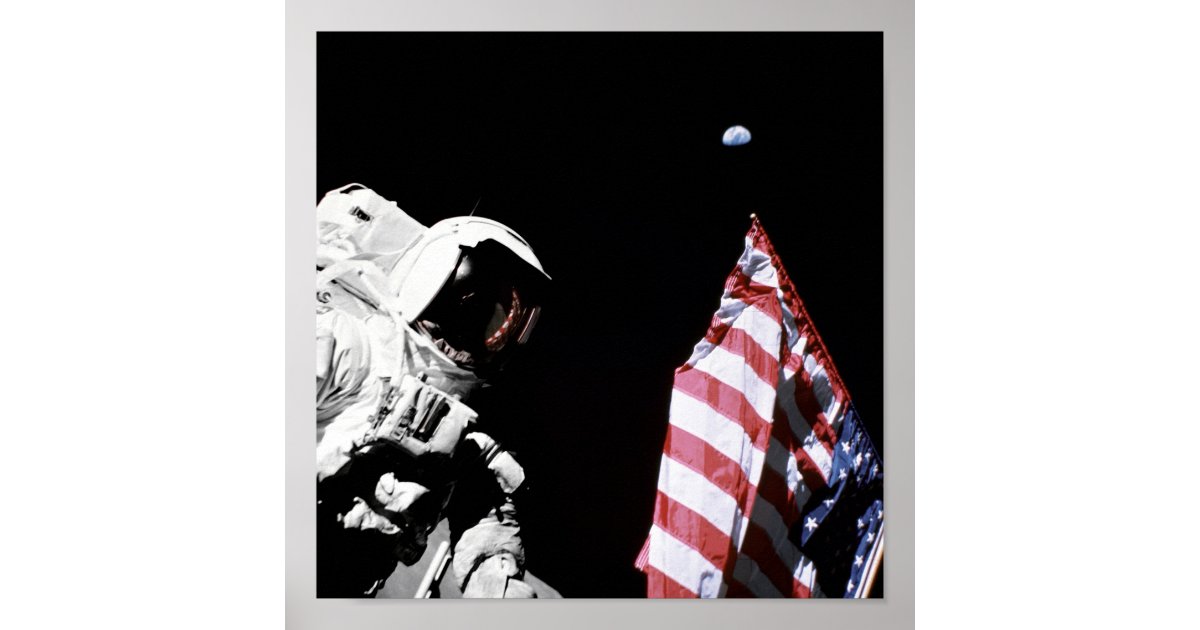 astronaut on moon by the american flag