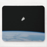 NASA Astronaut Spacewalking Above Earth