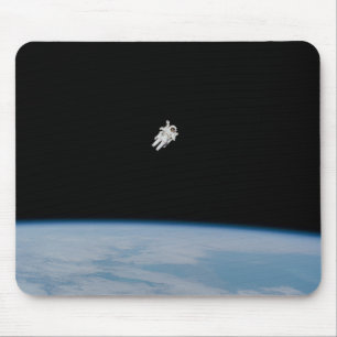 NASA Astronaut Spacewalking Above Earth Mouse Pad