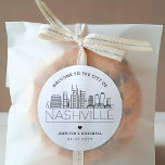 Nashville Skyline | Wedding Welcome Favor Classic Round Sticker<br><div class="desc">Enhance your wedding welcome packages or event party favors with a custom set of welcome stickers! These elegant yet minimal-style stickers are tailored for a wedding taking place in the beautiful city of Nashville. They feature a modern deco skyline with the name of the city integrated underneath. All elements of...</div>