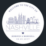 Nashville Skyline | Wedding Welcome Navy Classic Round Sticker<br><div class="desc">Enhance your wedding welcome packages or event party favors with a custom set of welcome stickers! These elegant yet minimal-style stickers are tailored for a wedding taking place in the beautiful city of Nashville. They feature a modern deco skyline with the name of the city integrated underneath. All elements of...</div>